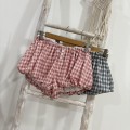 Low-rise plaid tulip shorts
